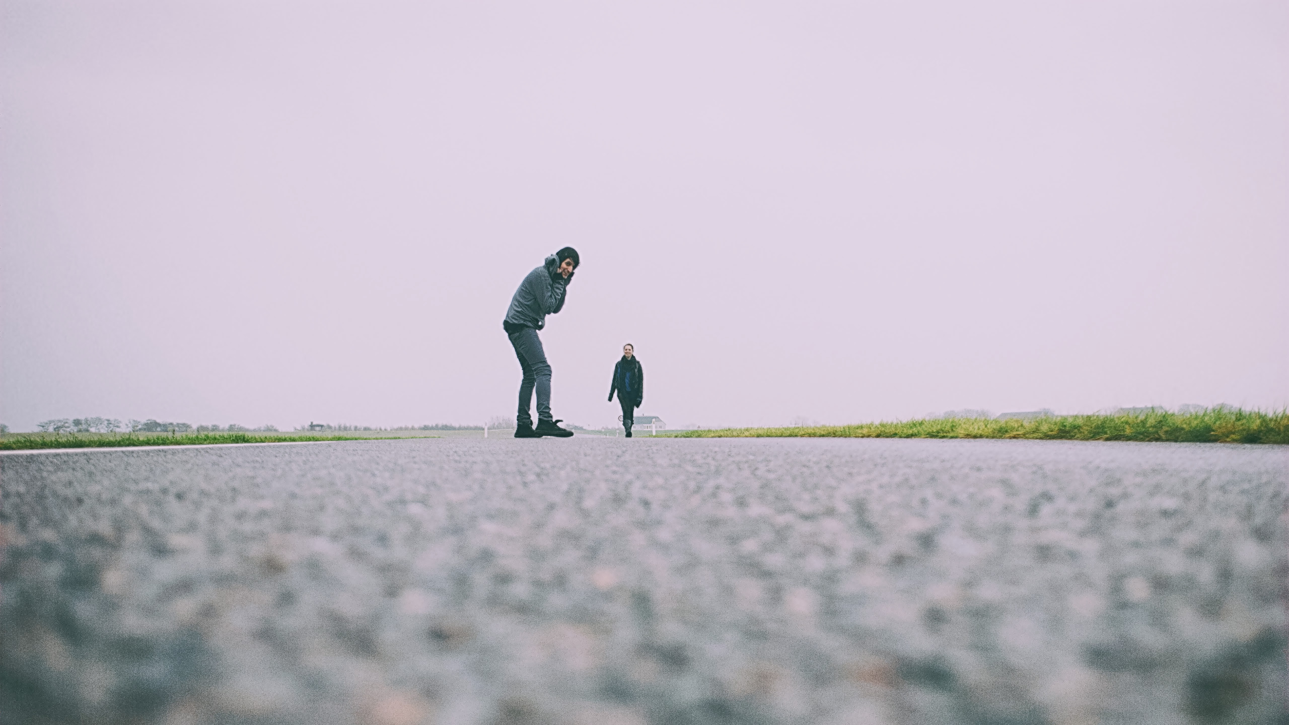 A lonely road leading towards the Wadden sea in Højer Denmark