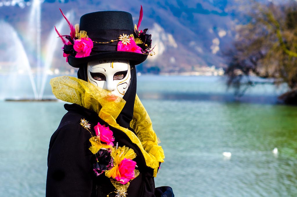 A lone masquerader by the lake in Annecy