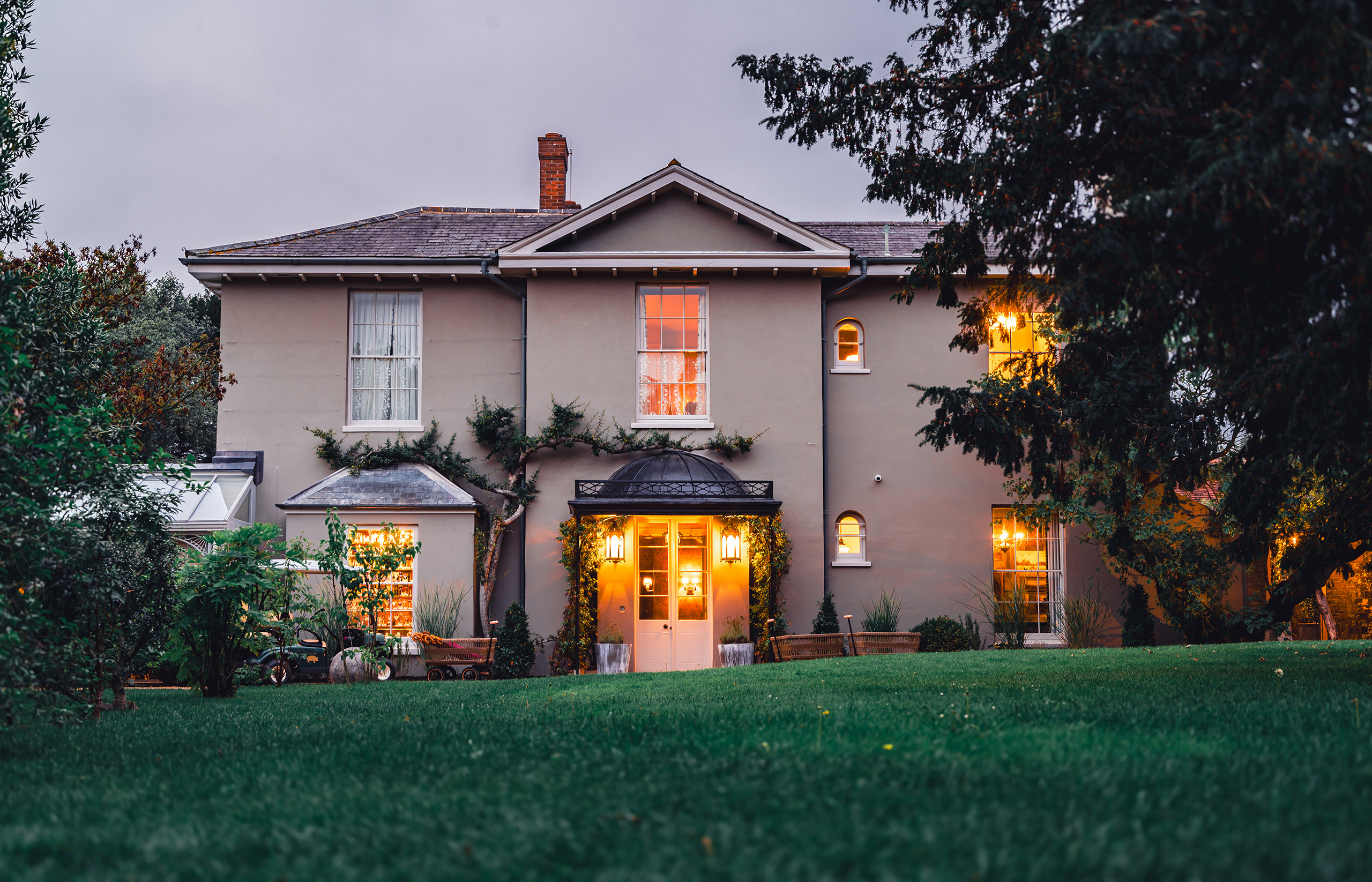 The Pig in the South Downs hotel building surrounded by scenic country